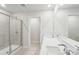 Bright bathroom features double sinks, frameless shower, and modern fixtures at 827 Blue Canyon Dr, York, SC 29745
