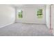 Neutral bedroom featuring carpet and two windows with natural light at 827 Blue Canyon Dr, York, SC 29745