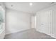 Cozy bedroom with neutral carpet, white walls, and a bright window at 827 Blue Canyon Dr, York, SC 29745