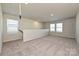 Spacious loft area with plush carpeting, natural light, and neutral paint at 827 Blue Canyon Dr, York, SC 29745