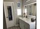 Clean bathroom with white vanity and mirror at 8905 Vagabond Rd, Charlotte, NC 28227