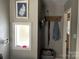 Small bathroom with window and linen closet at 8905 Vagabond Rd, Charlotte, NC 28227