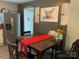 Bright dining area with a wood table at 8905 Vagabond Rd, Charlotte, NC 28227