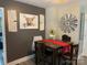 Farmhouse-style dining area with table and chairs at 8905 Vagabond Rd, Charlotte, NC 28227