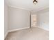 Spacious bedroom with access to upper floor and carpet flooring at 9042 Summer Club Rd, Charlotte, NC 28277