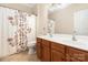 Bathroom with double vanity and shower/tub combo at 1108 Butterburr Dr, Matthews, NC 28104