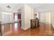 Bright and spacious foyer with hardwood floors and elegant decor at 1108 Butterburr Dr, Matthews, NC 28104