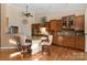 Eat-in kitchen with granite countertops and hardwood floors at 1108 Butterburr Dr, Matthews, NC 28104