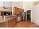 Kitchen features stainless steel appliances and granite countertops at 1108 Butterburr Dr, Matthews, NC 28104