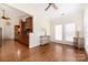 Sunroom with hardwood floors, multiple windows, and kitchen view at 1108 Butterburr Dr, Matthews, NC 28104