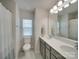 Bathroom with double vanity and shower/tub combo at 12024 John Newton Dr # 41, Davidson, NC 28036