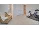 Bedroom with Peloton bike and en-suite bath at 12024 John Newton Dr # 41, Davidson, NC 28036