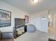 Spacious bedroom with a TV, beanbag chair, and closet at 12024 John Newton Dr # 41, Davidson, NC 28036