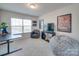 Cozy bedroom featuring a TV, beanbag chair, and window at 12024 John Newton Dr # 41, Davidson, NC 28036