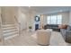 Spacious living room with gray sectional sofa and fireplace at 12024 John Newton Dr # 41, Davidson, NC 28036