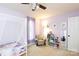 Light and airy bedroom with a built-in bookcase and ceiling fan at 1226 Twin Lakes Rd, Rock Hill, SC 29732