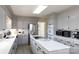 Modern kitchen boasts white quartz countertops, gray cabinets, and a large island at 1226 Twin Lakes Rd, Rock Hill, SC 29732