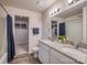 Double vanity bathroom with granite countertops and walk-in shower at 136 Jo Creek Ln, Harmony, NC 28634