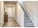 Light-filled foyer with grey carpeting, wooden flooring, and a storage cabinet at 136 Jo Creek Ln, Harmony, NC 28634