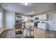 Modern kitchen featuring stainless steel appliances and a breakfast nook at 136 Jo Creek Ln, Harmony, NC 28634