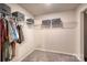 Large walk-in closet with wire shelving and ample hanging space at 136 Jo Creek Ln, Harmony, NC 28634