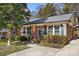 Brick ranch house with carport and mature landscaping at 1737 Edgewater Dr, Charlotte, NC 28210