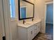 Double vanity bathroom with quartz countertop and black matte fixtures at 1858 Yardley St, Rock Hill, SC 29732