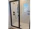 Modern shower with frameless glass enclosure and marble-style tile at 1858 Yardley St, Rock Hill, SC 29732