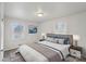 Main bedroom with neutral decor, carpet, and two windows at 2016 Norwich Pl, Charlotte, NC 28208