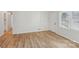 Dining room with hardwood floors and neutral walls at 2016 Norwich Pl, Charlotte, NC 28208