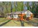 Side view of brick ranch home with covered porch at 2016 Norwich Pl, Charlotte, NC 28208