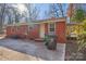 Back of house with patio and yard at 2016 Norwich Pl, Charlotte, NC 28208