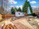 Backyard with patio, shed, and wooden fence at 2532 Governors Pointe Ne Ct, Concord, NC 28025