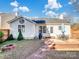 Backyard with patio, shed, and wooden fence at 2532 Governors Pointe Ne Ct, Concord, NC 28025