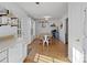 Bright dining area adjacent to the kitchen with hardwood floors at 2532 Governors Pointe Ne Ct, Concord, NC 28025