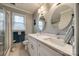 Updated bathroom with double vanity and a large shower at 2722 Hillmont Dr, Charlotte, NC 28226