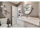 Clean bathroom with white vanity and a large mirror at 2722 Hillmont Dr, Charlotte, NC 28226