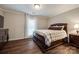 Spacious bedroom with wood flooring and large window at 2722 Hillmont Dr, Charlotte, NC 28226