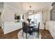 Charming dining room with a round table, four chairs, and stylish chandelier at 2722 Hillmont Dr, Charlotte, NC 28226