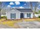 Charming ranch home with gray siding, white trim, and landscaped yard at 2722 Hillmont Dr, Charlotte, NC 28226