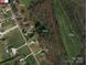 Aerial view of property showing home and surrounding land at 4006 Sincerity Rd, Monroe, NC 28110