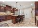 Kitchen featuring stainless steel appliances, an island with seating, and custom cabinetry at 4006 Sincerity Rd, Monroe, NC 28110