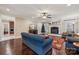 Living room features hardwood floors, fireplace and large windows at 4006 Sincerity Rd, Monroe, NC 28110