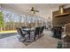 Screened porch with grill and outdoor furniture at 4006 Sincerity Rd, Monroe, NC 28110