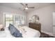 This bedroom features neutral walls, carpeted floors, and abundant natural light at 405 Newstyle Way # 1, Cramerton, NC 28056