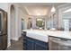 This kitchen features a large farmhouse sink, stainless steel appliances, and ample counter space at 405 Newstyle Way # 1, Cramerton, NC 28056