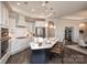 Well-appointed kitchen with a large island, pendant lighting, and stainless steel appliances at 405 Newstyle Way # 1, Cramerton, NC 28056