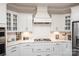 Bright kitchen with white cabinetry, subway tile backsplash, and modern appliances at 405 Newstyle Way # 1, Cramerton, NC 28056