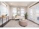 Cozy sunroom featuring a chaise lounge, modern lighting, and large windows with natural light at 405 Newstyle Way # 1, Cramerton, NC 28056