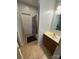 Clean bathroom with shower/tub combo, vanity, and tile floor at 507 Brookwood St, Mooresville, NC 28115